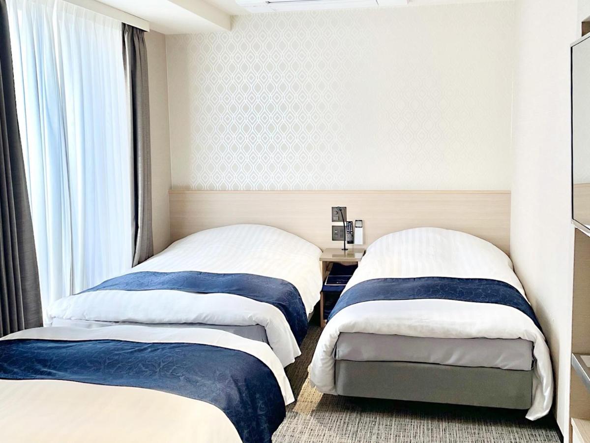 โฮเต็ล อเบส แกรนด์ ทาคาซึกิ Hotel ทะกะสึกิ ภายนอก รูปภาพ