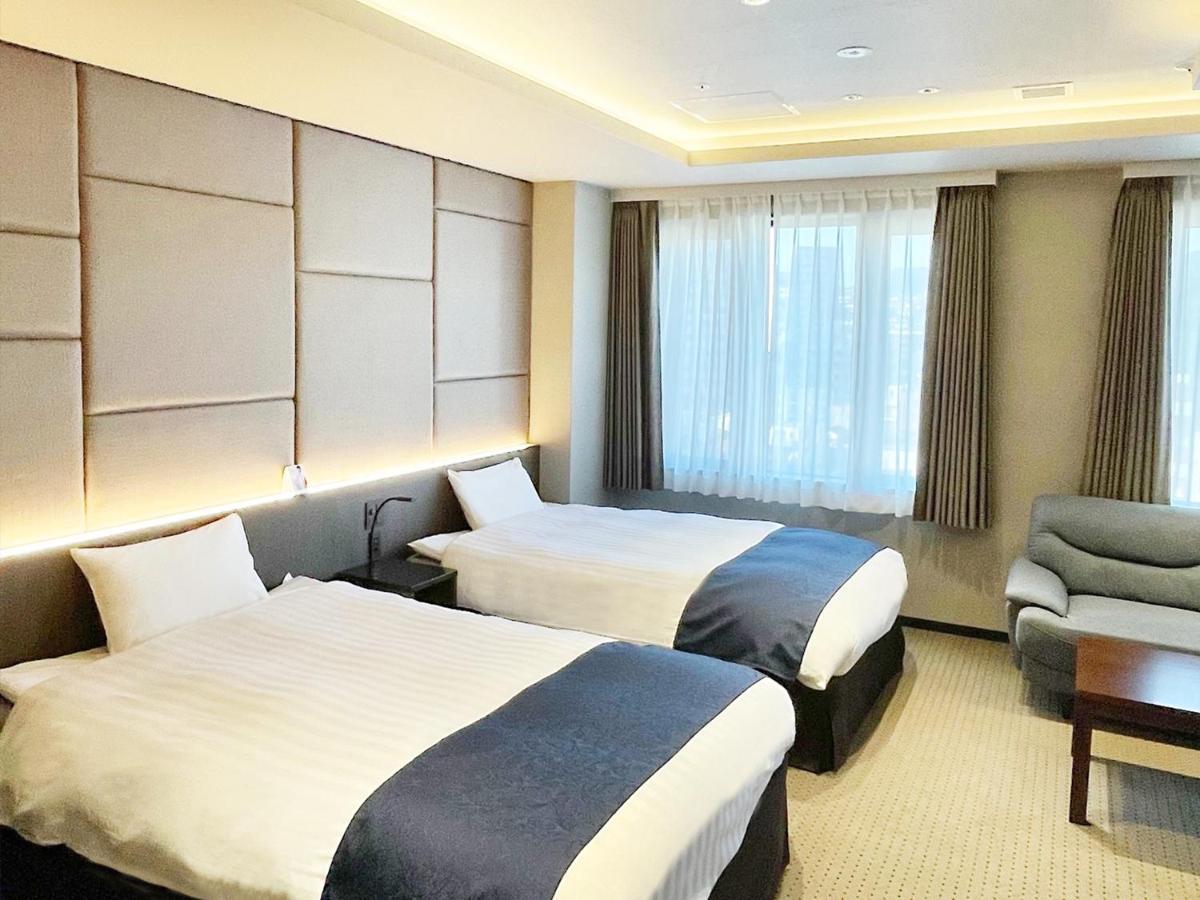 โฮเต็ล อเบส แกรนด์ ทาคาซึกิ Hotel ทะกะสึกิ ภายนอก รูปภาพ